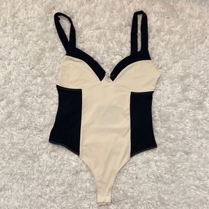 Tan and black body suit. Size medium. Brand - Lelis.
